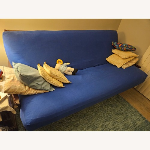 Used Blue Futon for sale on AptDeco