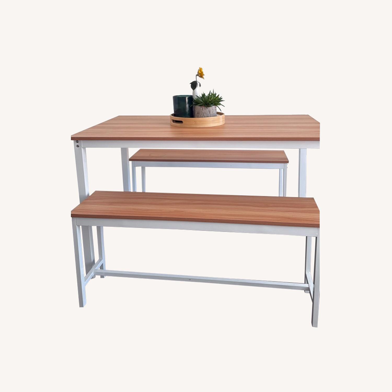 Light Brown Wood Dining Table - image-0