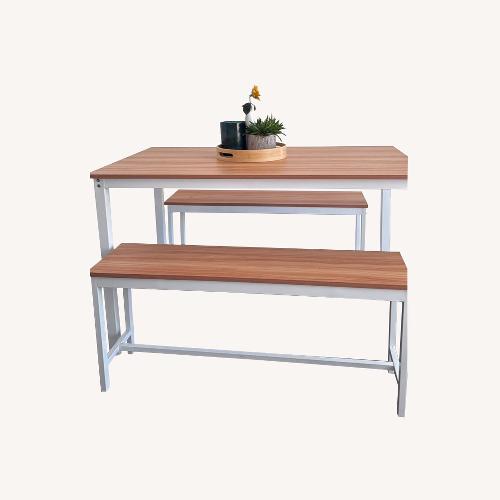 Used Light Brown Wood Dining Table for sale on AptDeco