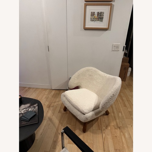 Used Pelican-Style Chair in Off-White for sale on AptDeco