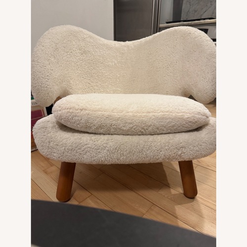 Used Pelican-Style Chair in Off-White for sale on AptDeco