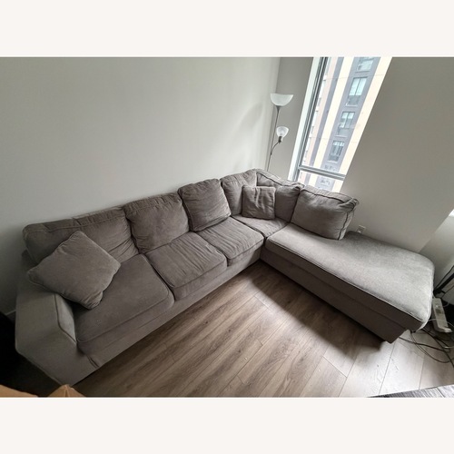 Used Ashley Furniture Light Gray Sleeper Sofa for sale on AptDeco