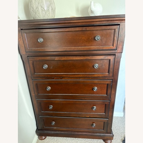 Used Ashley Furniture Dark Brown Wood Dresser for sale on AptDeco