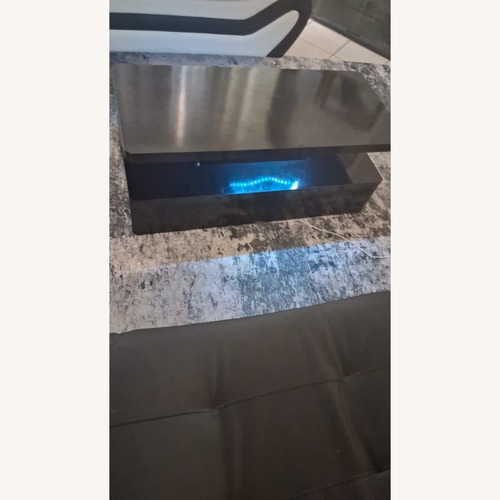 Used Dark Brown Marble Coffee Table for sale on AptDeco