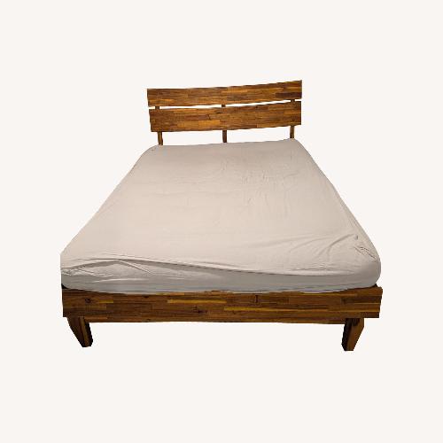 Used The Futon Shop Natural Wool Queen Bed for sale on AptDeco