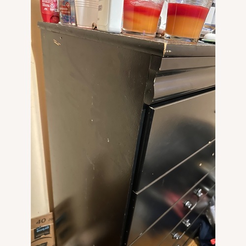 Used Vintage/Antique Black Wood Dresser for sale on AptDeco