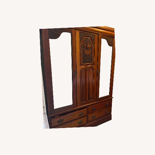 Used Vintage/Antique Finds Dark Brown Wood Armoire for sale on AptDeco