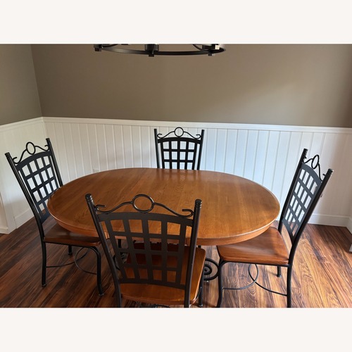 Used 5 Piece Oval Extendable Dining Set for sale on AptDeco