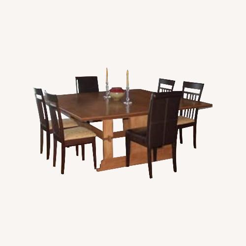 Used Light Brown Wood Dining Table for sale on AptDeco