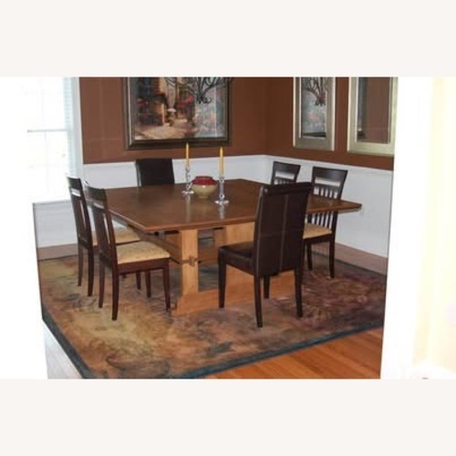 Used Light Brown Wood Dining Table for sale on AptDeco