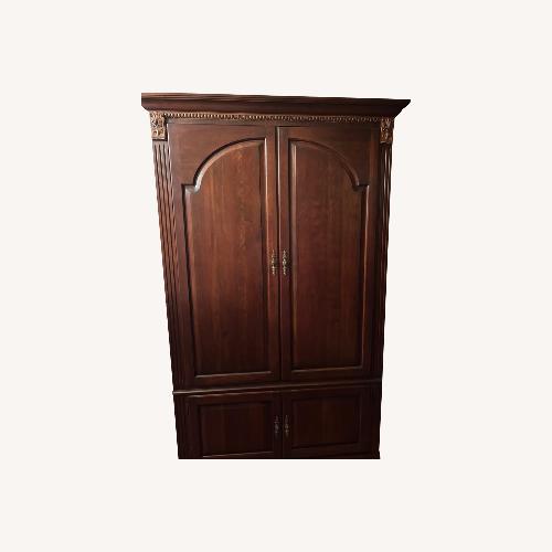 Used Ethan Allen Cherry Wood Wall Unit / Amoire for sale on AptDeco