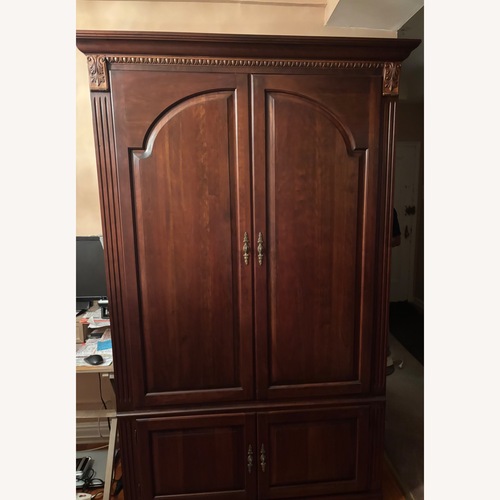 Used Ethan Allen Cherry Wood Wall Unit / Amoire for sale on AptDeco