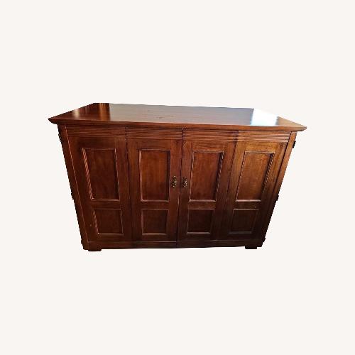 Used Vintage/Antique Dark Brown Armoire for sale on AptDeco