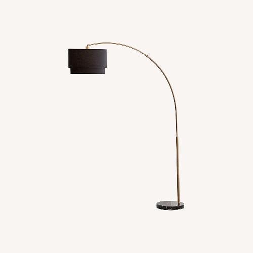 Used Meryl Arc Brass Floor Lamp with Black Shade for sale on AptDeco