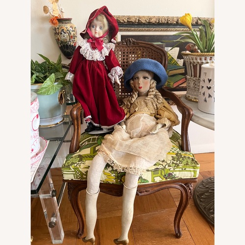 Used Seated 2 Antique Dolls on Wooden Chair for sale on AptDeco
