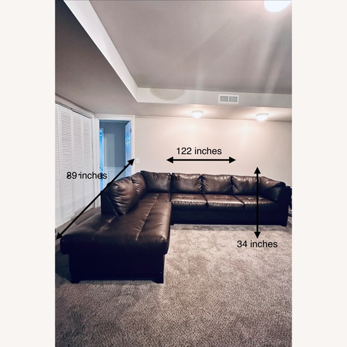 Used Albany Industries Dark Brown Faux Leather 2 Piece Sectional for sale on AptDeco