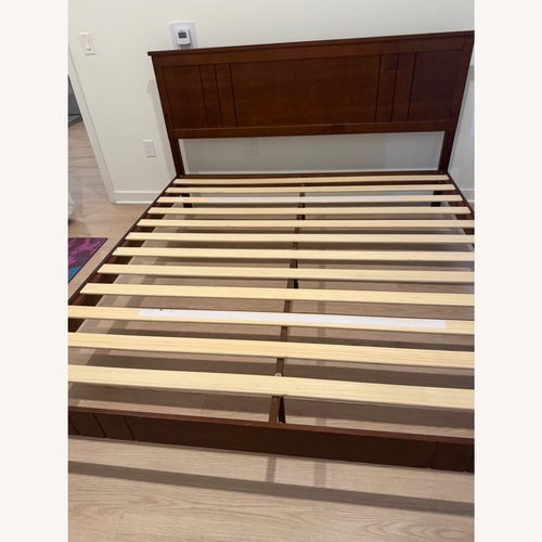 Used Wayfair Dark Brown Wood King Bed for sale on AptDeco