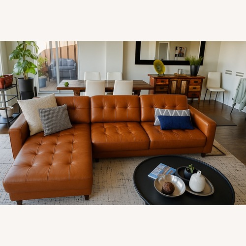 Used Light Brown Leather 2 Piece Sectional for sale on AptDeco