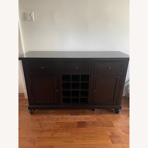 Used Pottery Barn Dark Brown Wood Sideboard for sale on AptDeco