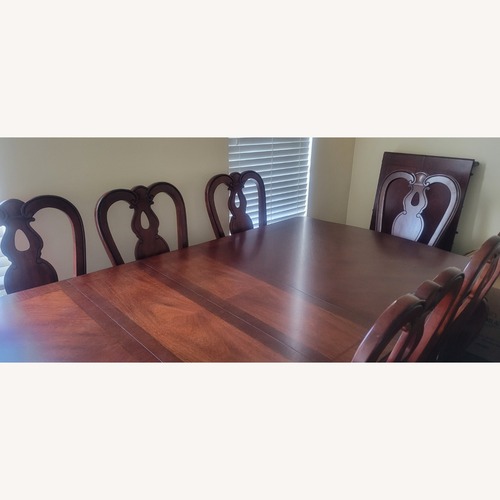 Used Macy's Dining Table, 8 Chairs, Leaf for sale on AptDeco