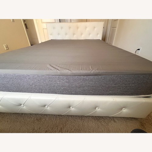 Used White Faux Leather Queen Bed for sale on AptDeco