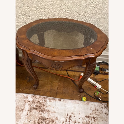 Used Vintage/Antique Dark Brown Wood Side Table for sale on AptDeco