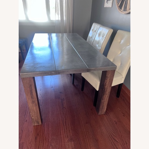 Used Crate & Barrel Galvin Steel Dining Table for sale on AptDeco