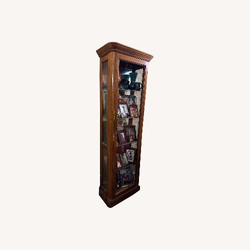 Used Vintage/Antique Dark Brown Wood Armoire for sale on AptDeco