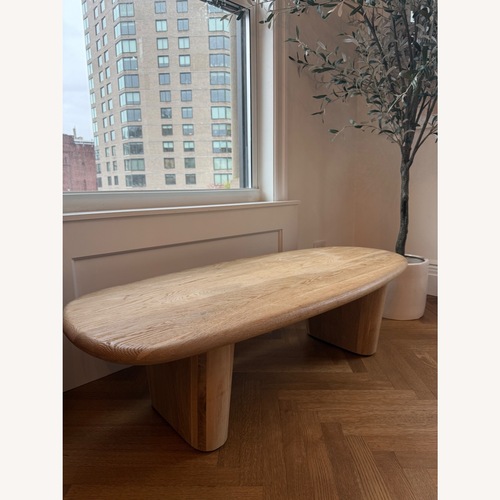 Used Kathy Kuo Home Laura Natural Oak Wood Round Edge Oval Coffee Table for sale on AptDeco