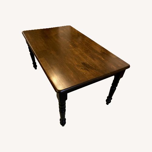 Used Solid Wood Dining Table for sale on AptDeco
