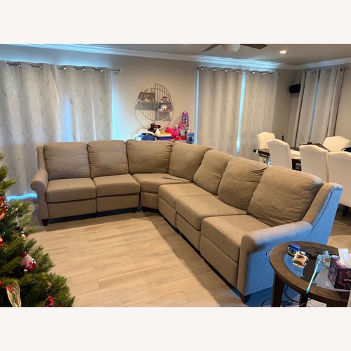 Used Bassett Magnificent Motion 4 Piece Sectional for sale on AptDeco