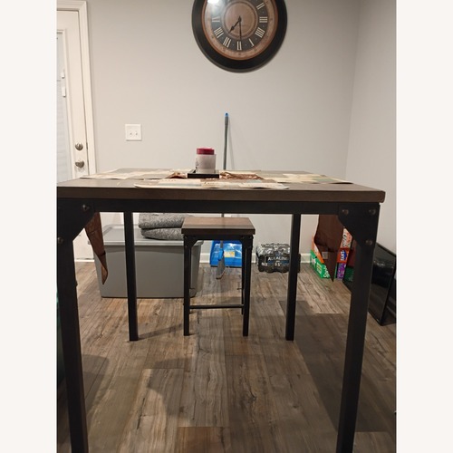 Used Vintage/Antique Dark Brown Wood Dining Table for sale on AptDeco