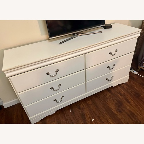 Used Raymour & Flanigan Anarasia White Dresser for sale on AptDeco