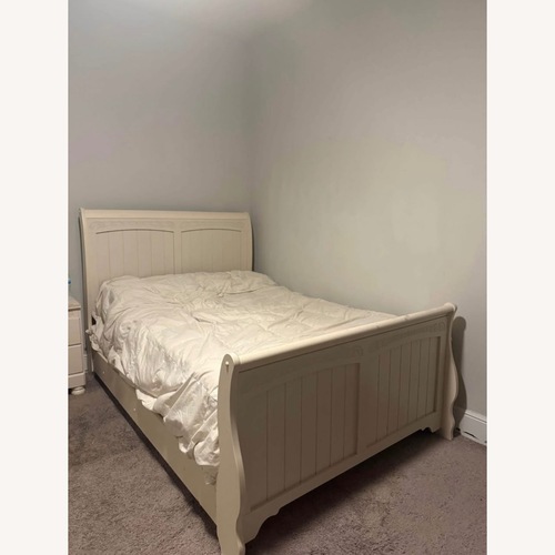 Used Natural Wood Full Bed for sale on AptDeco