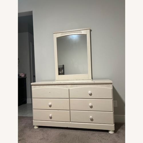 Used Ashley Furniture Natural Wood Dresser for sale on AptDeco