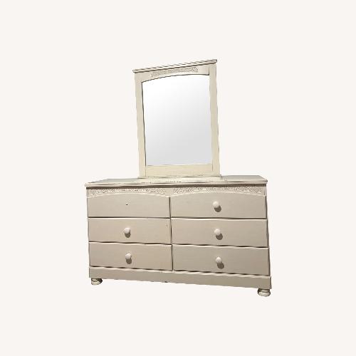 Used Ashley Furniture Natural Wood Dresser for sale on AptDeco
