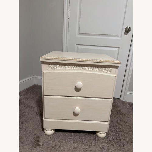 Used Ashley Furniture Natural Wood Dresser for sale on AptDeco