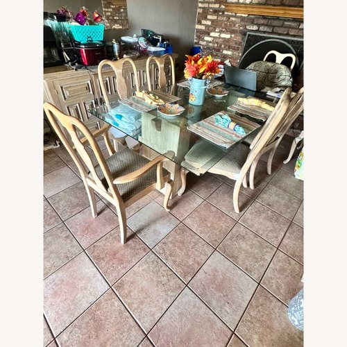 Used Italian Glass and Stone Base Dining set for sale on AptDeco