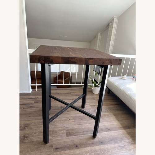 Used Williams Sonoma Dark Brown Wood Dining Table for sale on AptDeco