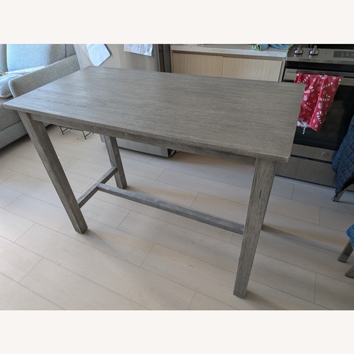 Used Wayfair Light Gray Wood Dining Table for sale on AptDeco