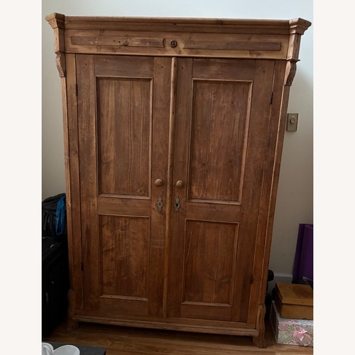 Used Natural Wood Armoire for sale on AptDeco