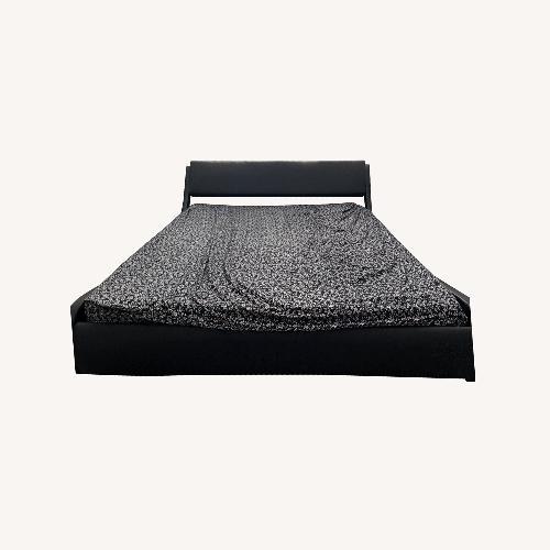 Used Black Faux Leather Queen Bed for sale on AptDeco