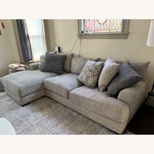 Used Raymour & Flanigan Light Gray 2 Piece Sectional for sale on AptDeco