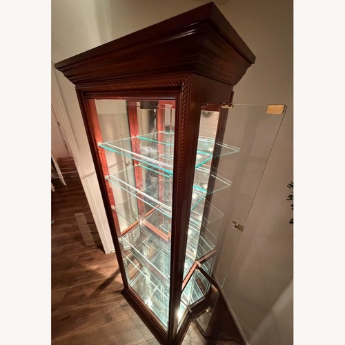 Used Pulaski Side Entry Curio with Glass Shelves for sale on AptDeco