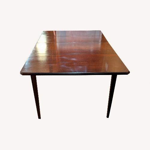 Used Vintage/Antique Dark Brown Dining Table for sale on AptDeco