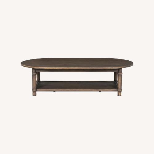 Used Lulu and Georgia Charnes Oval Coffee Table for sale on AptDeco