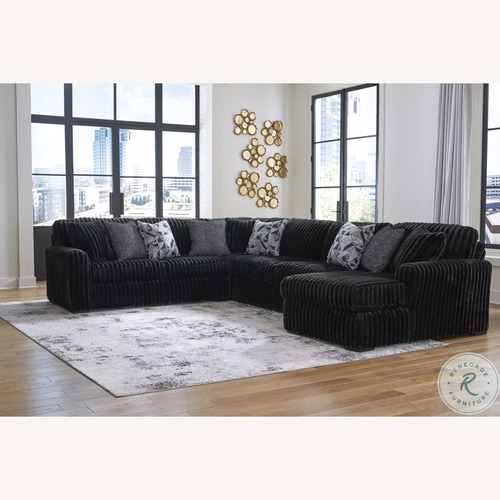 Used Ashley Furniture Black Fabric 3+ Piece Sectional for sale on AptDeco