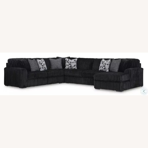 Used Ashley Furniture Black Fabric 3+ Piece Sectional for sale on AptDeco