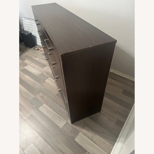 Used Ashley Furniture Dark Brown Wood Dresser for sale on AptDeco