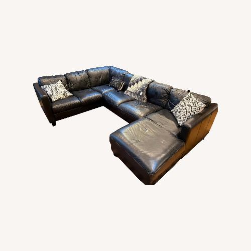 Used Black Leather 7 Cushion Sectional U-Shaped for sale on AptDeco